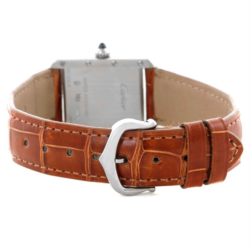 This image shows the back view of the Cartier Tank Louis W154105 Women's White Gold Silver Dial W154105 Women's White Gold Silver Dial watch, highlighting its brown leather strap and buckle.