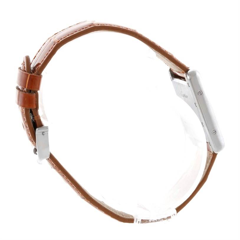 The image shows a side view of the Cartier Tank Louis W154105 Women's White Gold Silver Dial W154105 Women's White Gold Silver Dial watch, highlighting its brown leather strap and rectangular case.