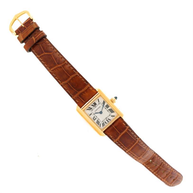 The image shows a Cartier Tank Louis W1529856 Women's Yellow Gold Silver Dial W1529856 Women's Yellow Gold Silver Dial watch, angled to display the front face and leather strap.