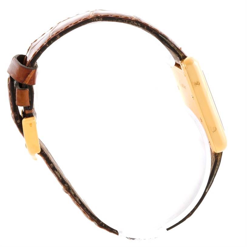 The image shows a Cartier Tank Louis W1529856 Women's Yellow Gold Silver Dial W1529856 Women's Yellow Gold Silver Dial watch from a side profile, displaying the case and brown leather strap.