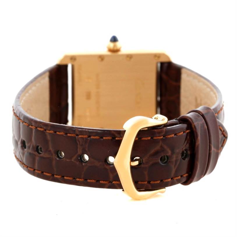 The image shows the rear angle of the Cartier Tank Louis W1529856 Women's Yellow Gold Silver Dial W1529856 Women's Yellow Gold Silver Dial watch, highlighting its brown leather strap and gold-tone buckle.