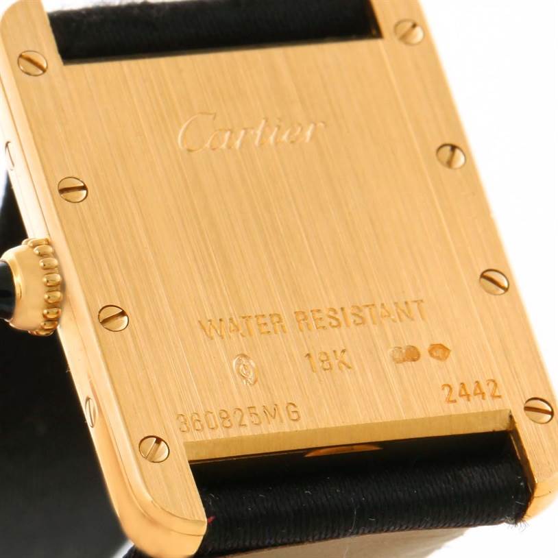 This image shows the back case of a Cartier Tank Louis W1529856 Women's Yellow Gold Silver Dial W1529856 Women's Yellow Gold Silver Dial watch, highlighting the 18K gold material and water resistance markings.