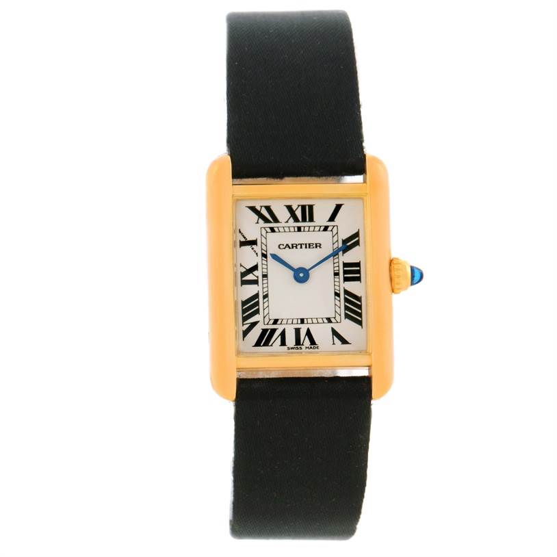 The image shows a front view of the Cartier Tank Louis W1529856 Women's Yellow Gold Silver Dial W1529856 Women's Yellow Gold Silver Dial watch, highlighting its rectangular case, Roman numeral dial, and black strap.