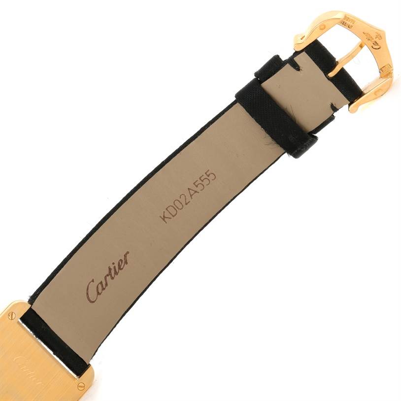 The image shows the inside of the strap and buckle of a Cartier Tank Louis W1529856 Women's Yellow Gold Silver Dial W1529856 Women's Yellow Gold Silver Dial watch.