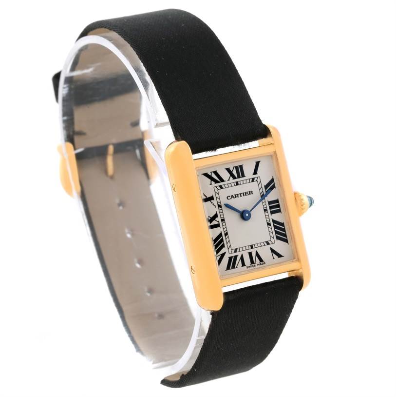 The image shows a Cartier Tank Louis W1529856 Women's Yellow Gold Silver Dial W1529856 Women's Yellow Gold Silver Dial watch at a three-quarter angle, highlighting its rectangular dial and leather strap.