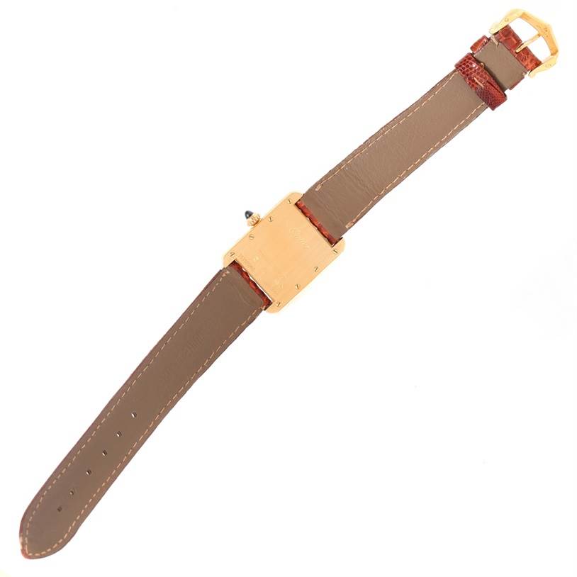 The image shows the backside and strap of a Cartier Tank Louis W1529856 Women's Yellow Gold Silver Dial W1529856 Women's Yellow Gold Silver Dial model watch, viewed from above.