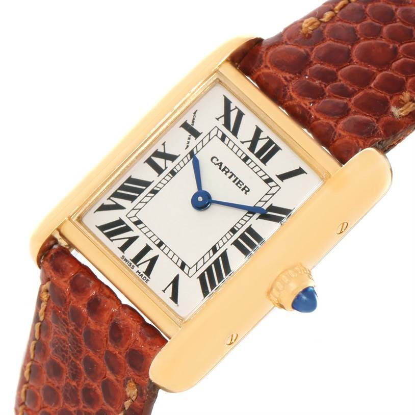 The image shows a Cartier Tank Louis W1529856 Women's Yellow Gold Silver Dial W1529856 Women's Yellow Gold Silver Dial watch from an angled view, highlighting the dial, case, and brown leather strap.