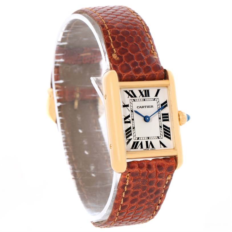 The image shows a Cartier Tank Louis W1529856 Women's Yellow Gold Silver Dial W1529856 Women's Yellow Gold Silver Dial watch at a slight angle, highlighting its face, brown leather strap, and gold casing.