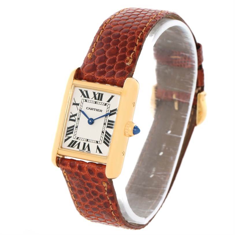 The image shows a Cartier Tank Louis W1529856 Women's Yellow Gold Silver Dial W1529856 Women's Yellow Gold Silver Dial watch at an angled view, highlighting the dial, brown leather strap, and gold case.