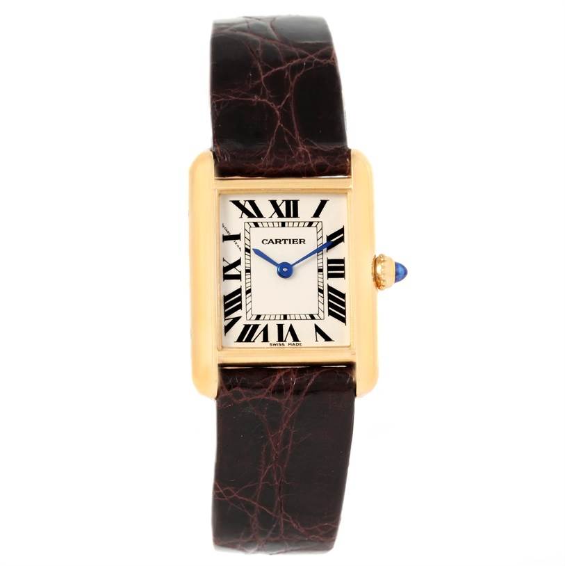 The image shows a front view of a Tank Louis model by Cartier, showcasing its rectangular dial, Roman numerals, and leather strap.