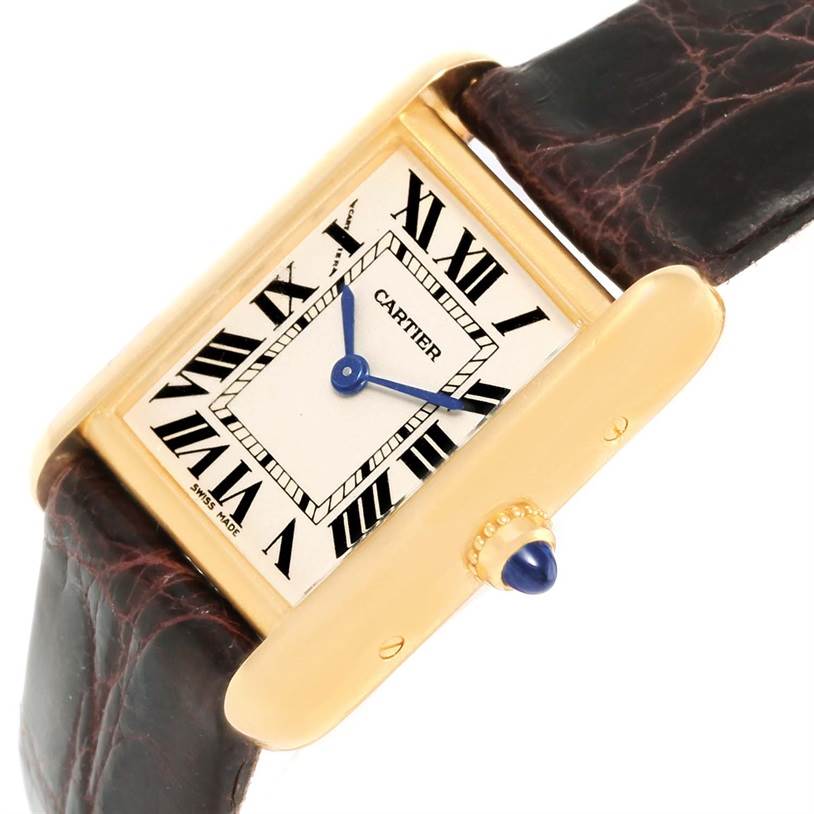 The image shows a Cartier Tank Louis W1529856 Women's Yellow Gold Silver Dial W1529856 Women's Yellow Gold Silver Dial watch angled diagonally, highlighting the dial, bezel, crown, and leather strap.