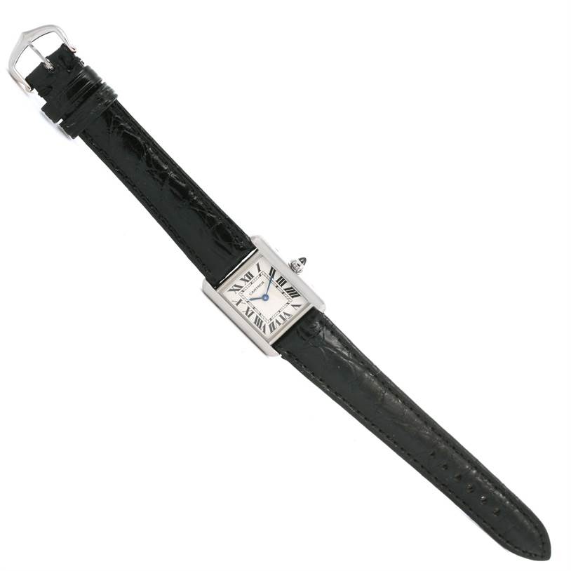 This image shows a Tank Louis watch by Cartier, displayed flat, showcasing its face, strap, and buckle.