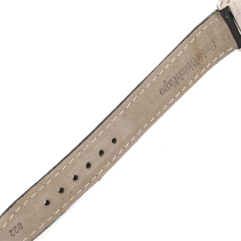 The image shows a close-up of the leather strap of a Cartier Tank Louis W1541056 Women's White Gold Silver Dial W1541056 Women's White Gold Silver Dial watch.