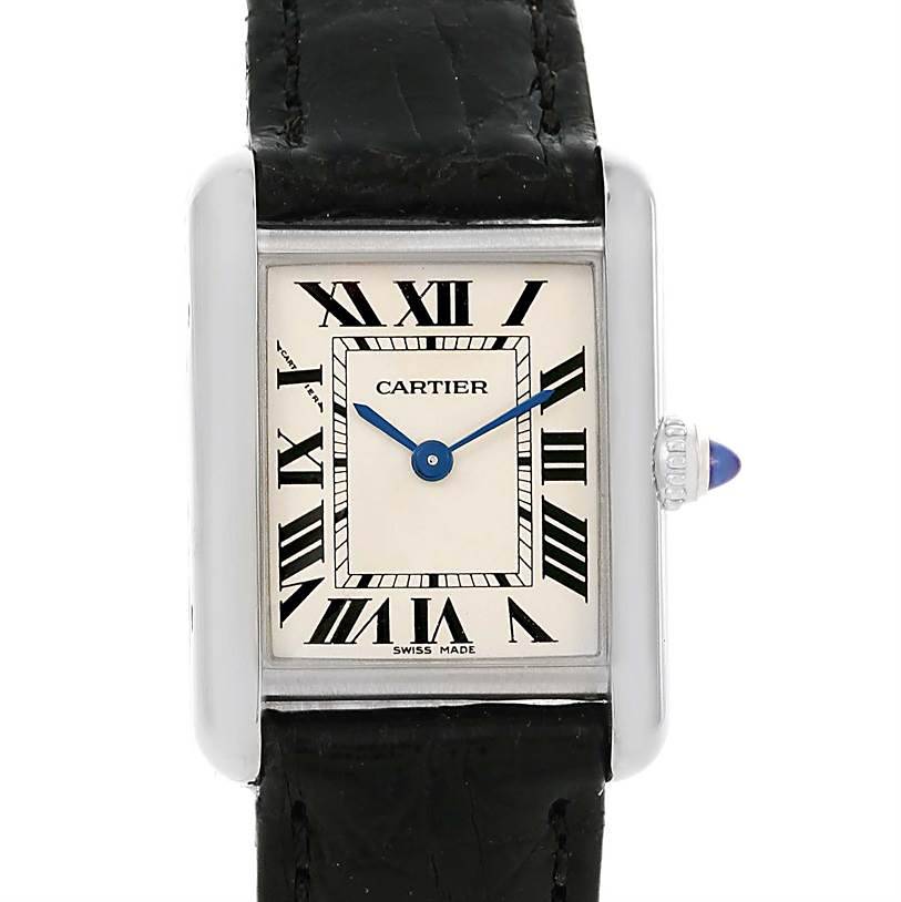 The image shows a front view of a Tank Louis Cartier watch, highlighting the face, hands, and part of the leather strap.