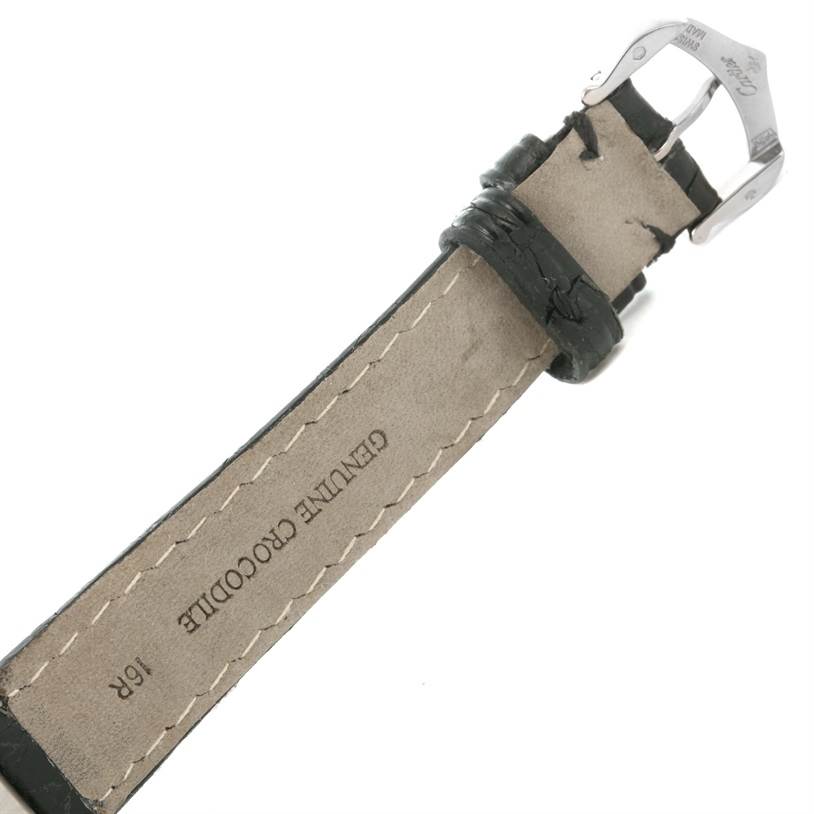 The image shows the underside of a genuine crocodile leather strap and buckle of a Cartier Tank Louis W1541056 Women's White Gold Silver Dial W1541056 Women's White Gold Silver Dial watch.