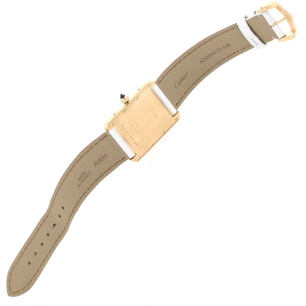 The image shows the back view of a Cartier Tank Louis W1529756 Women's Yellow Gold Silver Dial W1529756 Women's Yellow Gold Silver Dial watch, highlighting the case back and leather straps.