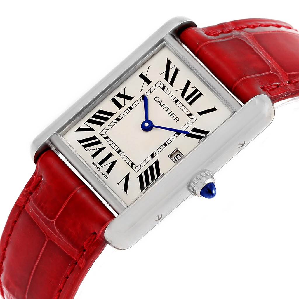 The image shows a Cartier Tank Louis W1540956 White Gold Silver Dial W1540956 White Gold Silver Dial watch at a tilted angle, highlighting its red leather strap, white dial, and blue hands.
