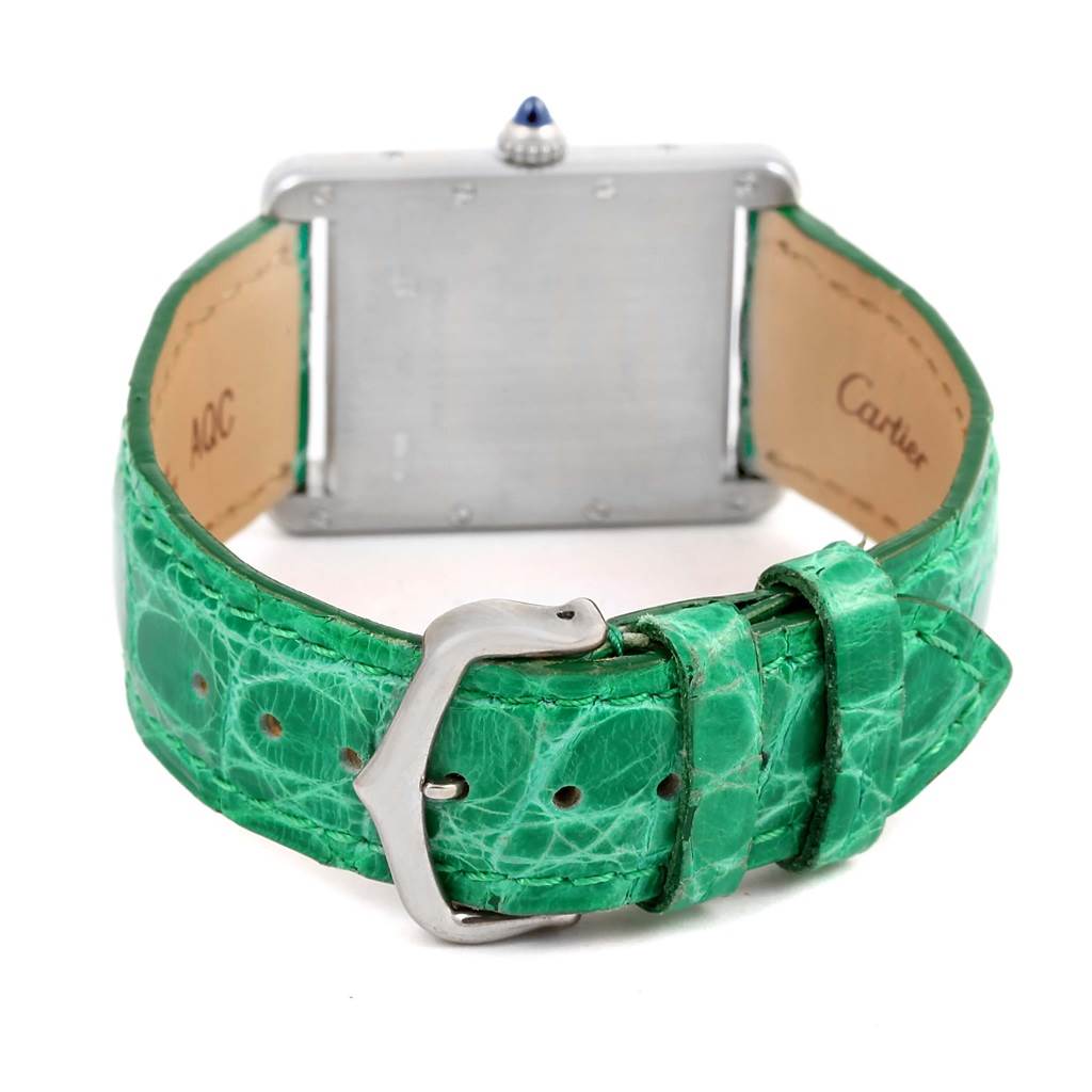 The image shows the back view of a Cartier Tank Louis W1540956 White Gold Silver Dial W1540956 White Gold Silver Dial watch, highlighting the green leather strap and buckle.