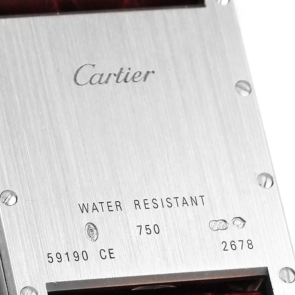 The image shows the back of a Cartier Tank Louis W1540956 White Gold Silver Dial W1540956 White Gold Silver Dial watch, including branding and specifications.