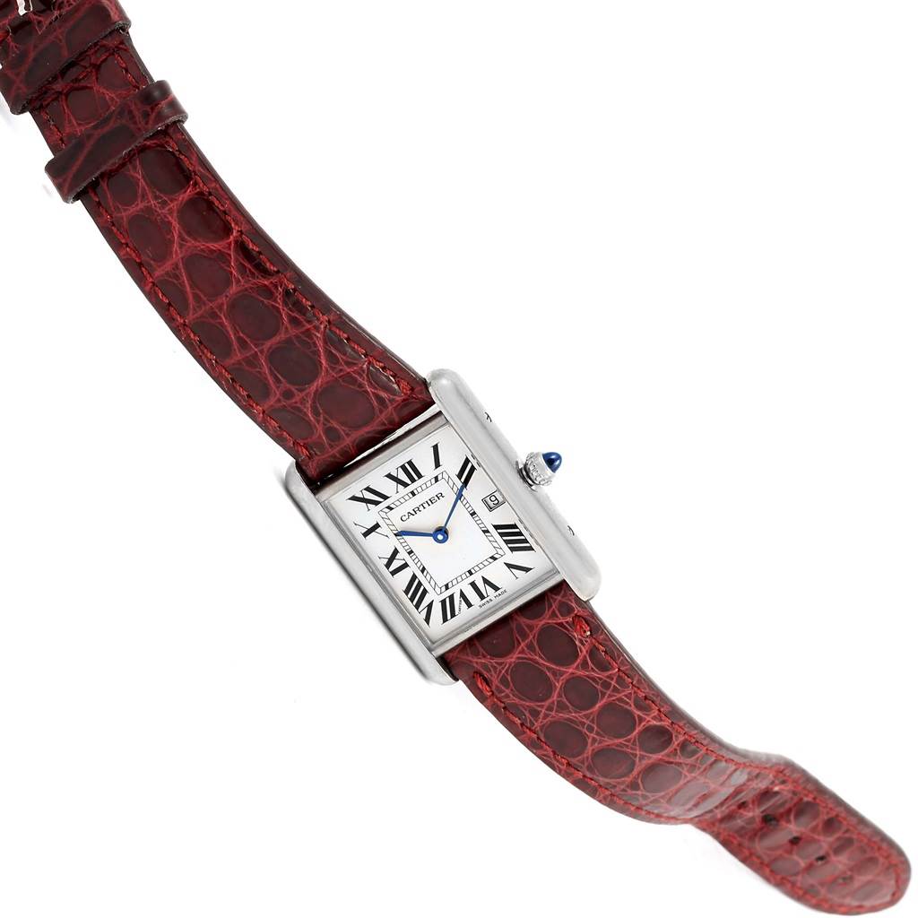 The image shows a Cartier Tank Louis W1540956 White Gold Silver Dial W1540956 White Gold Silver Dial watch at an angled top-down view, highlighting its face and red leather strap.