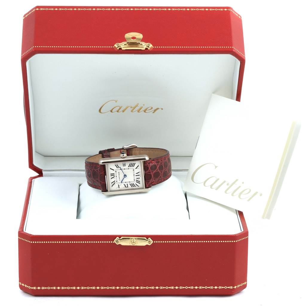 The image shows a Cartier Tank Louis W1540956 White Gold Silver Dial W1540956 White Gold Silver Dial watch with a red strap, displayed inside an open Cartier box, alongside the accompanying booklet.