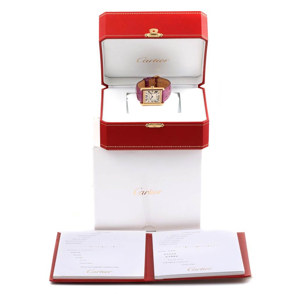 The image shows a Cartier Tank Louis W1529756 Yellow Gold Silver Dial W1529756 Yellow Gold Silver Dial model watch in an open box with documents displayed in front.