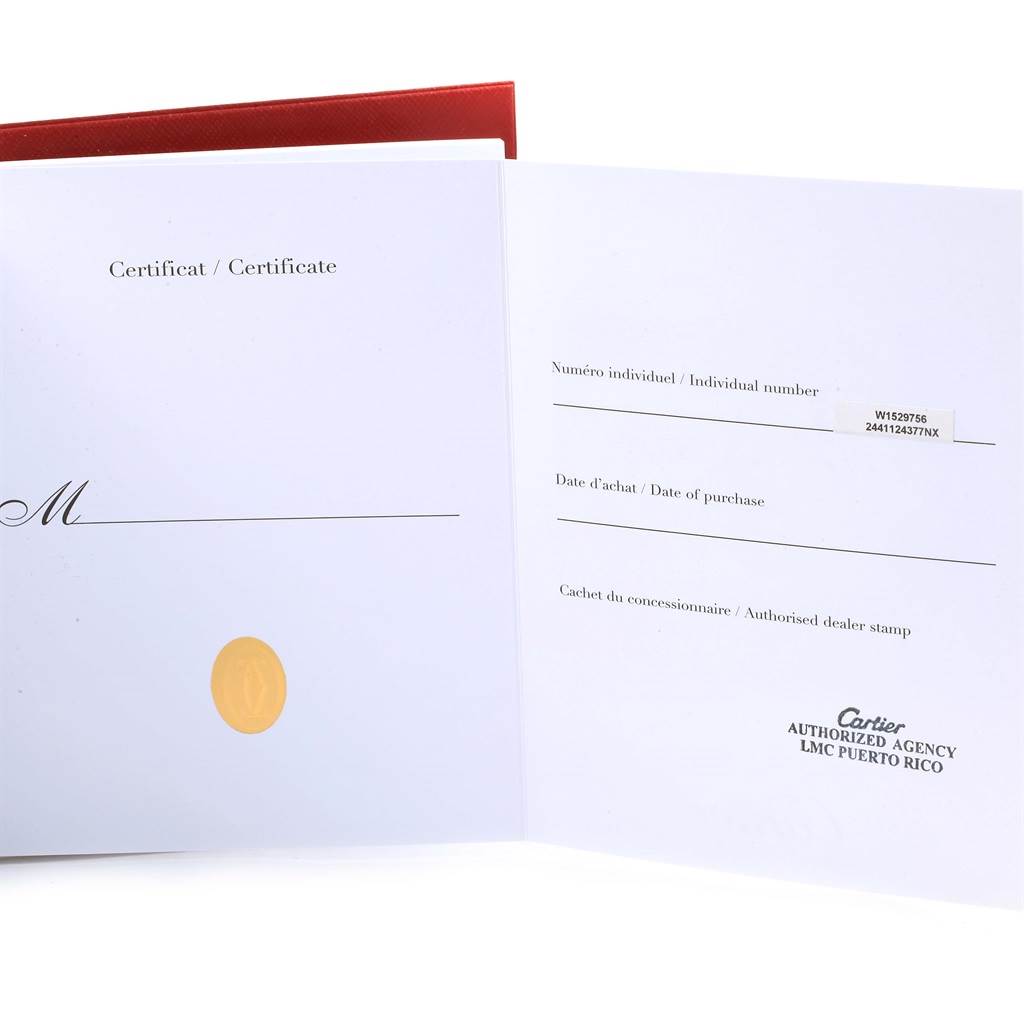 The image shows an open certificate for a Cartier Tank Louis W1529756 Yellow Gold Silver Dial W1529756 Yellow Gold Silver Dial watch, including spaces for the individual number, date of purchase, and dealer stamp.