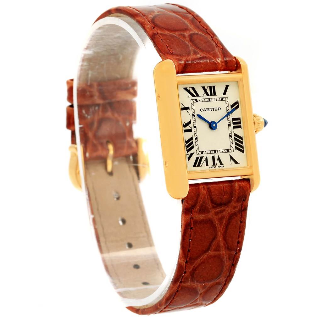 The image shows a Cartier Tank Louis W1529856 Women's Yellow Gold Silver Dial W1529856 Women's Yellow Gold Silver Dial watch at a three-quarter angle displaying the face, bezel, crown, and leather strap.