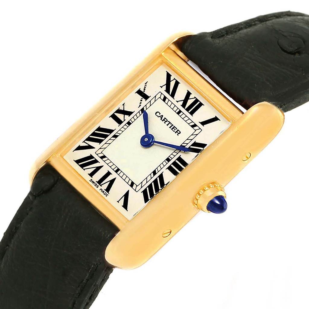 The image shows a Cartier Tank Louis W1529856 Women's Yellow Gold Silver Dial W1529856 Women's Yellow Gold Silver Dial watch from an angled top view, highlighting the face, crown, case, and part of the strap.