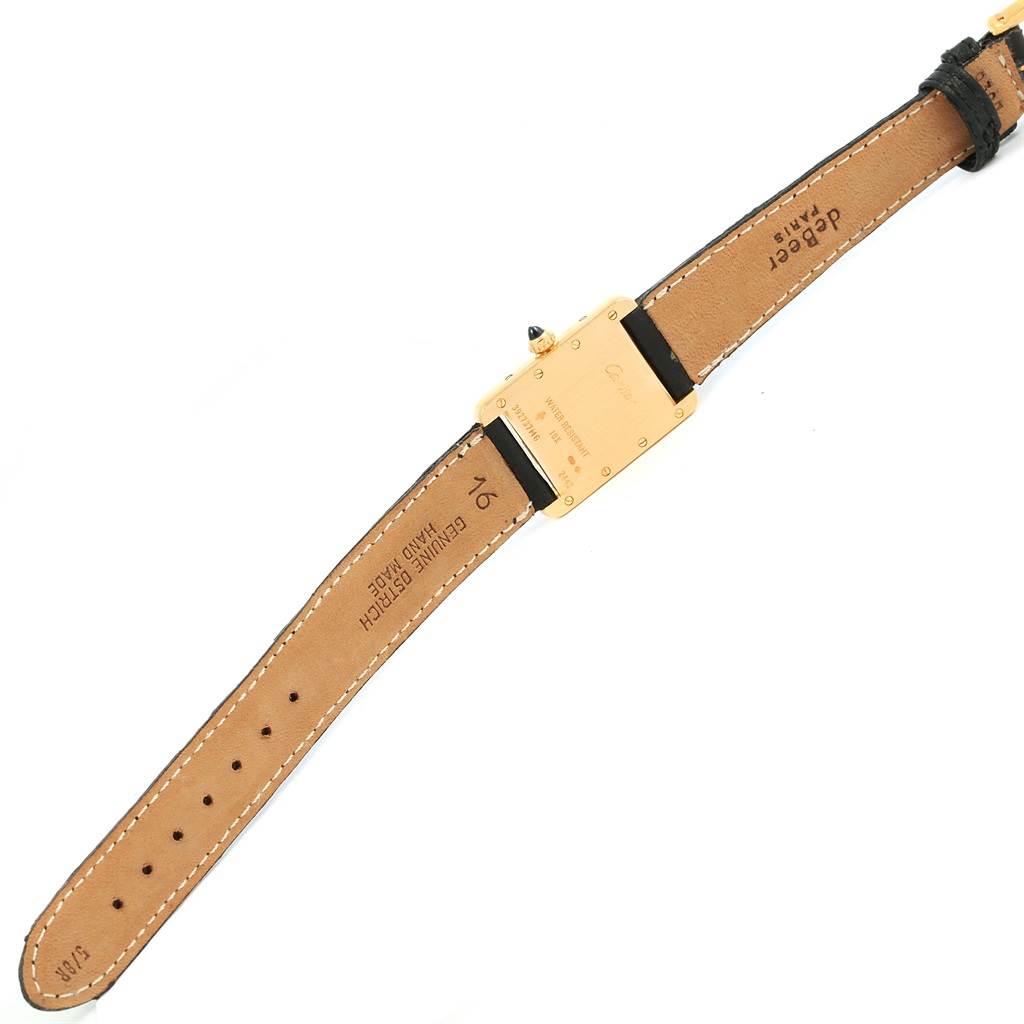 The image shows the back view of a Cartier Tank Louis W1529856 Women's Yellow Gold Silver Dial W1529856 Women's Yellow Gold Silver Dial watch, highlighting the leather strap and the underside of the casing.