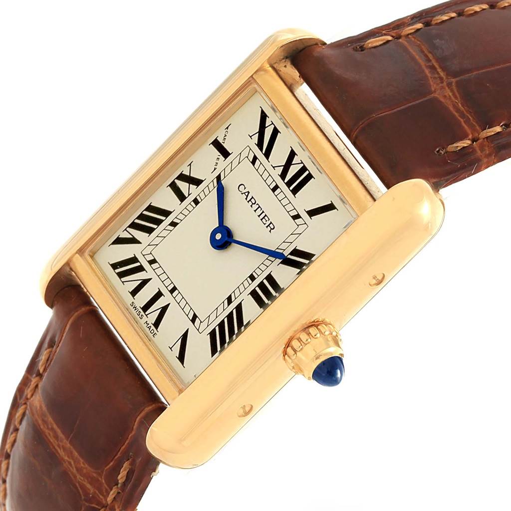 The image shows a Cartier Tank Louis W1529856 Women's Yellow Gold Silver Dial W1529856 Women's Yellow Gold Silver Dial watch at an angled view highlighting the dial, brown leather strap, and crown.