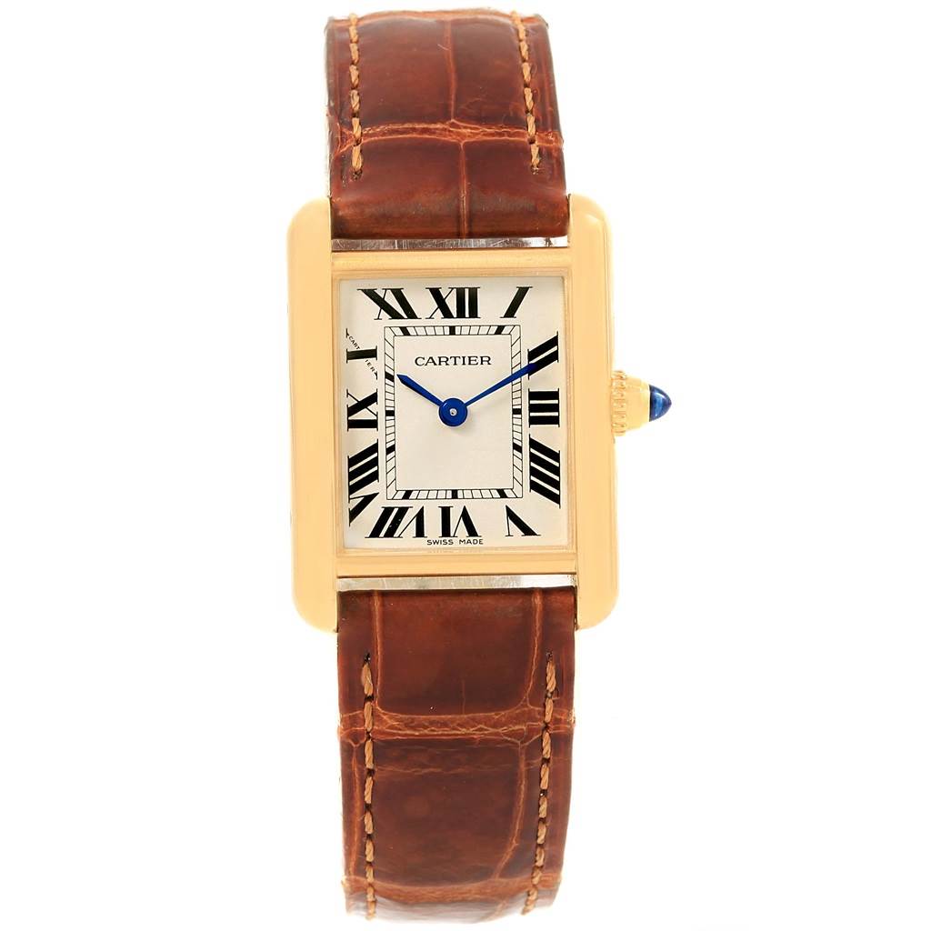 The image shows a front view of the Cartier Tank Louis W1529856 Women's Yellow Gold Silver Dial W1529856 Women's Yellow Gold Silver Dial watch, including its face, leather strap, and part of the crown.