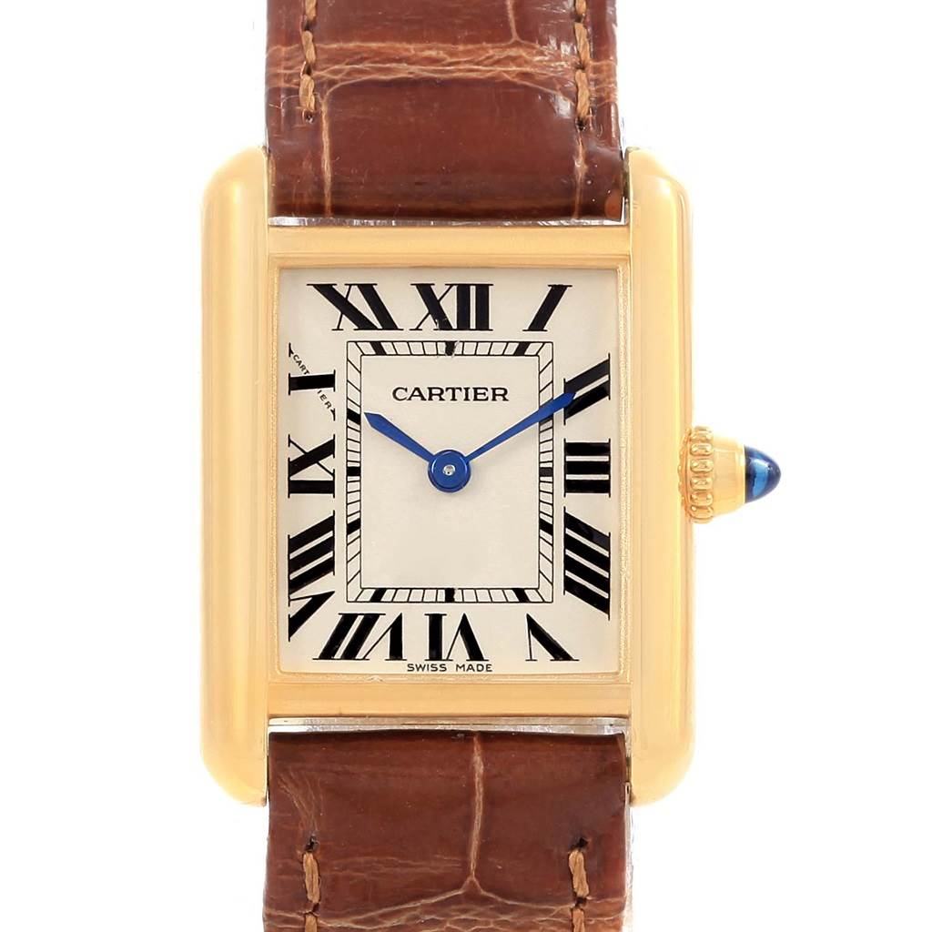 The image shows a Cartier Tank Louis W1529856 Women's Yellow Gold Silver Dial W1529856 Women's Yellow Gold Silver Dial watch from a front angle, highlighting its rectangular dial, Roman numerals, blue hands, and brown leather strap.