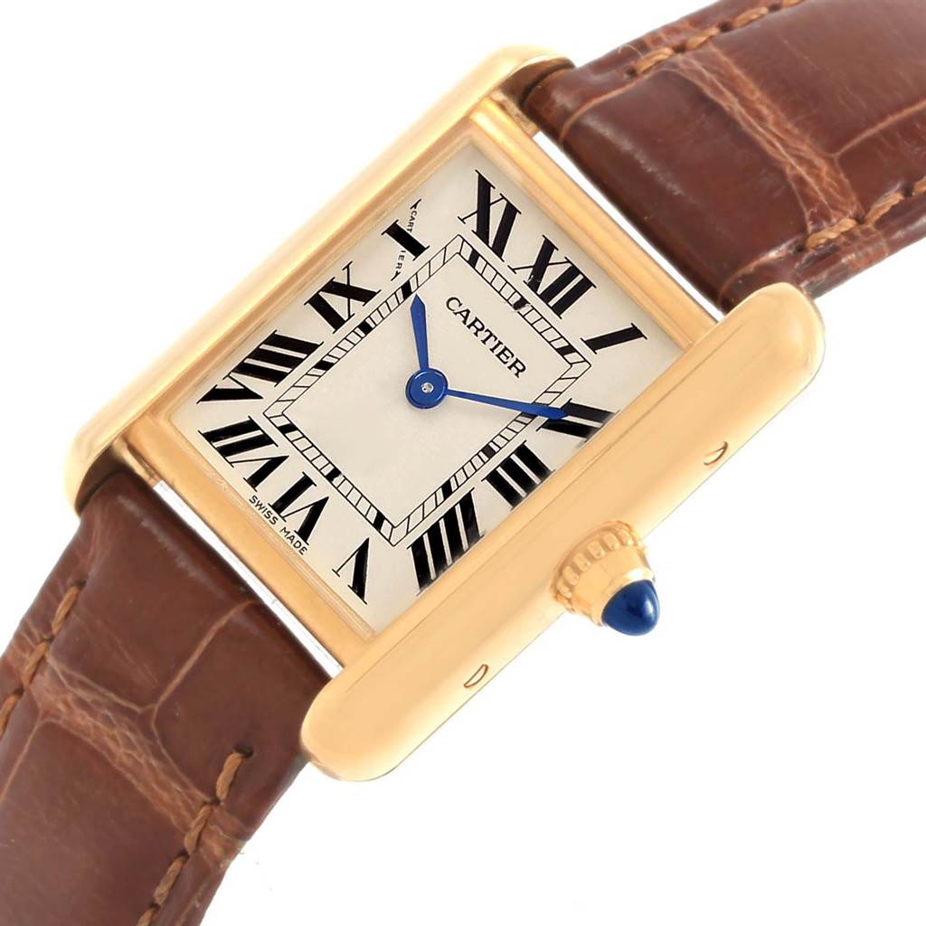 The image shows a Cartier Tank Louis W1529856 Women's Yellow Gold Silver Dial W1529856 Women's Yellow Gold Silver Dial watch from an angled side view, highlighting the dial, crown, and brown leather strap.