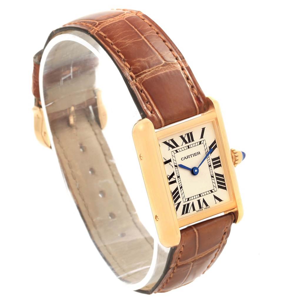 The image shows the front and side view of a Cartier Tank Louis W1529856 Women's Yellow Gold Silver Dial W1529856 Women's Yellow Gold Silver Dial watch with a brown leather strap and gold casing.