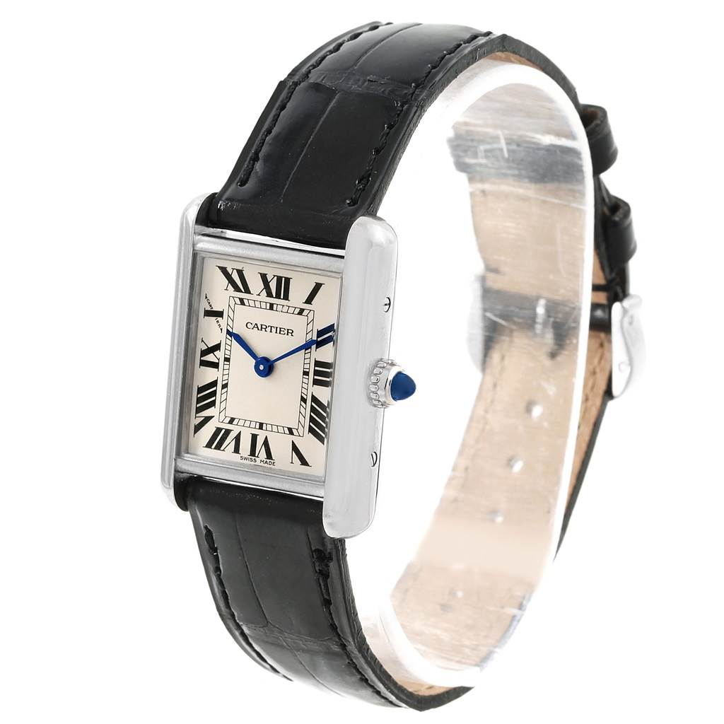 The image shows a Cartier Tank Louis W1541056 Women's White Gold Silver Dial W1541056 Women's White Gold Silver Dial watch from a front-left angle, highlighting its square dial, Roman numerals, and black leather strap.