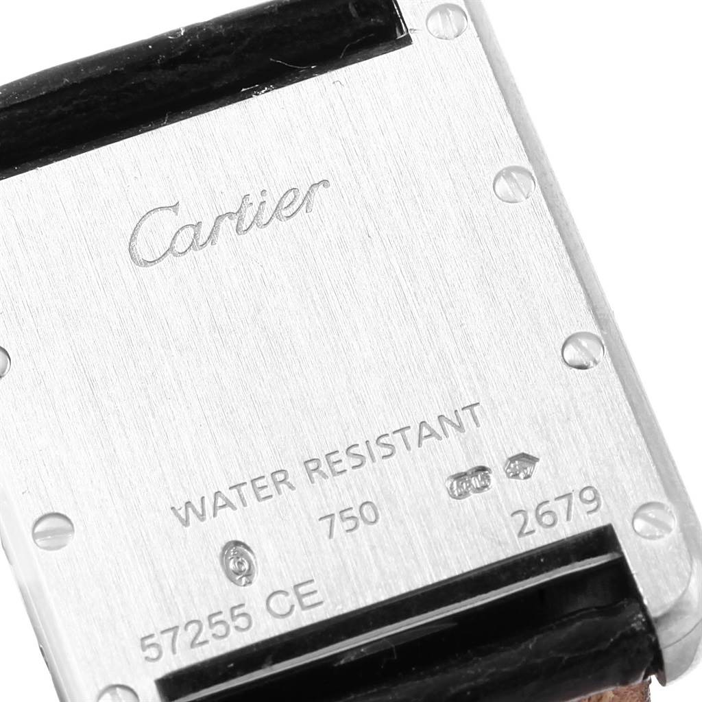 The image shows the back case of a Cartier Tank Louis W1541056 Women's White Gold Silver Dial W1541056 Women's White Gold Silver Dial watch, highlighting the brand name and model details.