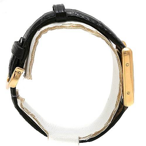 The image shows a side view of the Cartier Tank Louis W1529856 Women's Yellow Gold Silver Dial W1529856 Women's Yellow Gold Silver Dial model watch, highlighting its strap, clasp, and gold case.