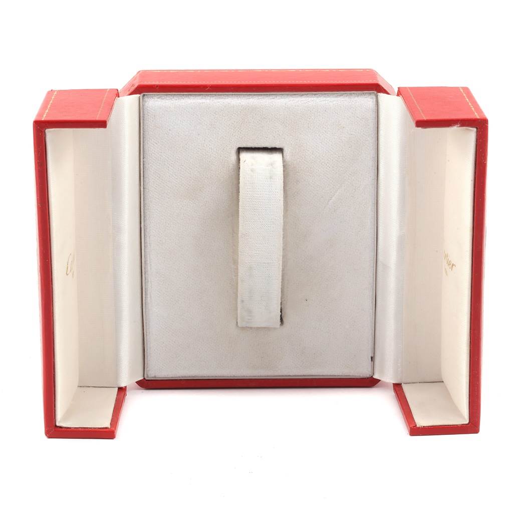 This image shows an empty Cartier Tank Louis W129856 Women
s Yellow Gold Silver Dial W129856 Women
s Yellow Gold Silver Dial watch box with a red exterior and cushioned interior.