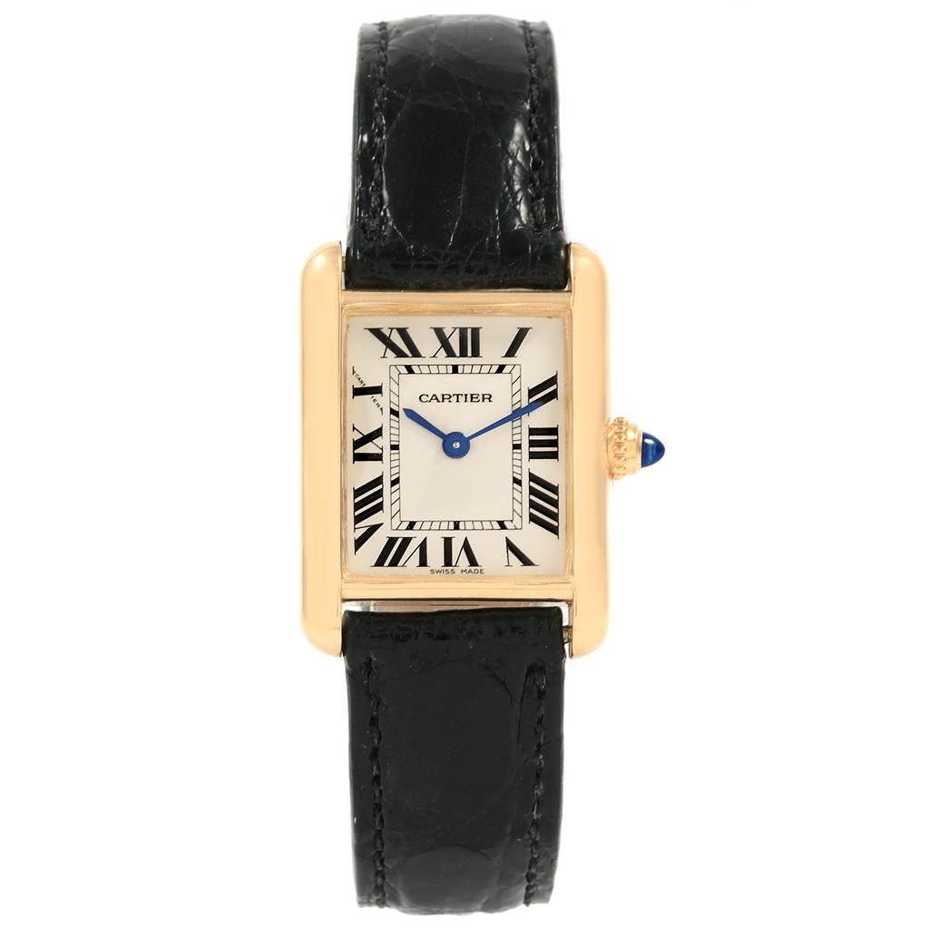 The image shows a front view of a Cartier Tank Louis W129856 Women
s Yellow Gold Silver Dial W129856 Women
s Yellow Gold Silver Dial watch, highlighting its rectangular face, leather strap, and blue cabochon crown.