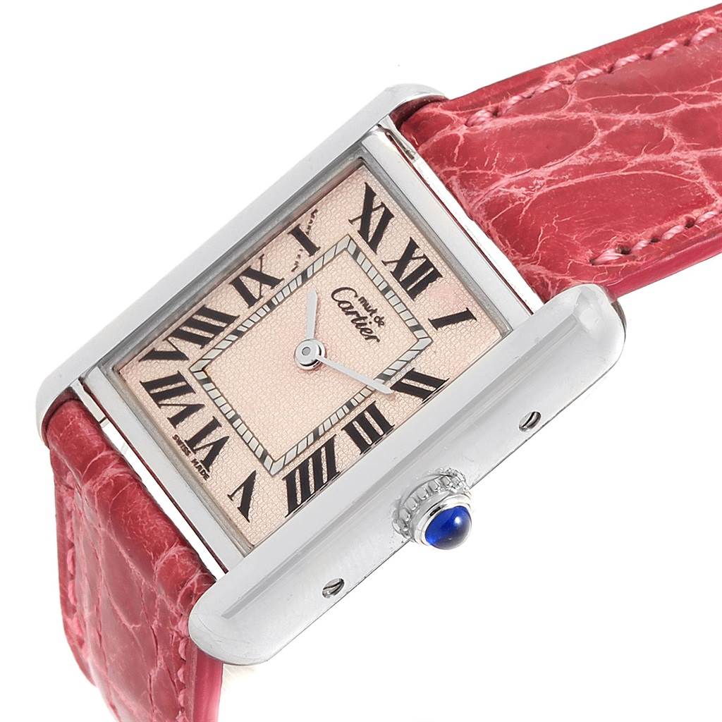 The image shows a Cartier Tank Louis 8129 Women's Stainless Steel Pink Dial 8129 Women's Stainless Steel Pink Dial watch from an angled side view, highlighting the dial, red strap, and crown.