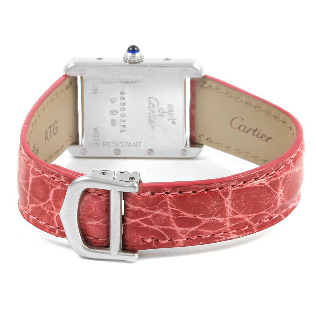 This image shows the back view of the Cartier Tank Louis 8129 Women's Stainless Steel Pink Dial 8129 Women's Stainless Steel Pink Dial watch, highlighting its caseback, red leather strap, and deployment clasp.