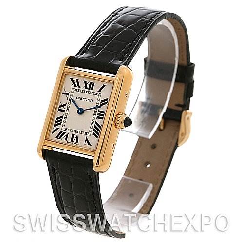 The Cartier Tank Louis W1529856 Women's Yellow Gold White Dial W1529856 Women's Yellow Gold White Dial watch is shown at a slight angle, highlighting its rectangular dial, gold case, and black leather strap.