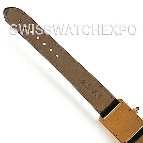 The image shows the back view of a Tank Louis model by Cartier, highlighting the strap and part of the watch casing.