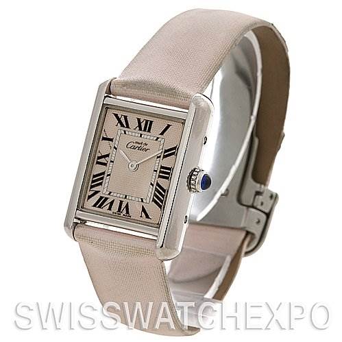 This image shows a Cartier Tank Louis Women's Stainless Steel Pink Dial Women's Stainless Steel Pink Dial watch from an angled view, featuring the face, strap, and side crown.