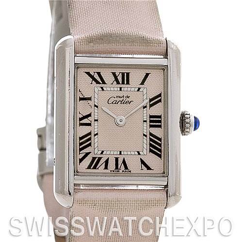 The image shows a frontal view of a Cartier Tank Louis Women's Stainless Steel Pink Dial Women's Stainless Steel Pink Dial watch, highlighting its rectangular face, Roman numerals, and beige strap.