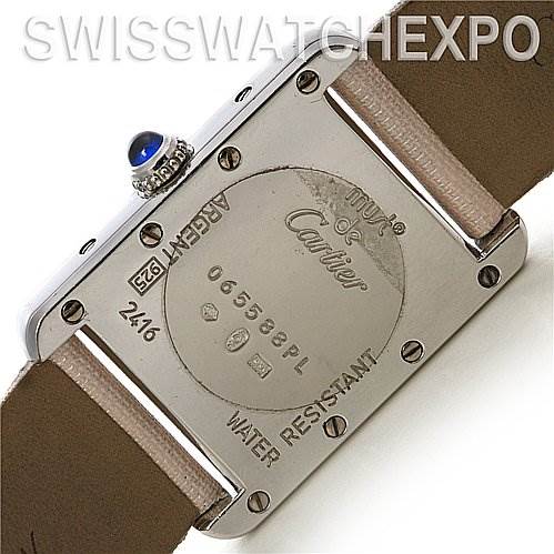 The image shows the back case of a Cartier Tank Louis Women's Stainless Steel Pink Dial Women's Stainless Steel Pink Dial watch, including its engravings and part of the leather strap.