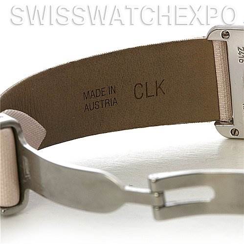 The image shows the clasp and inner leather band with "MADE IN AUSTRIA" text of a Tank Louis model by Cartier.