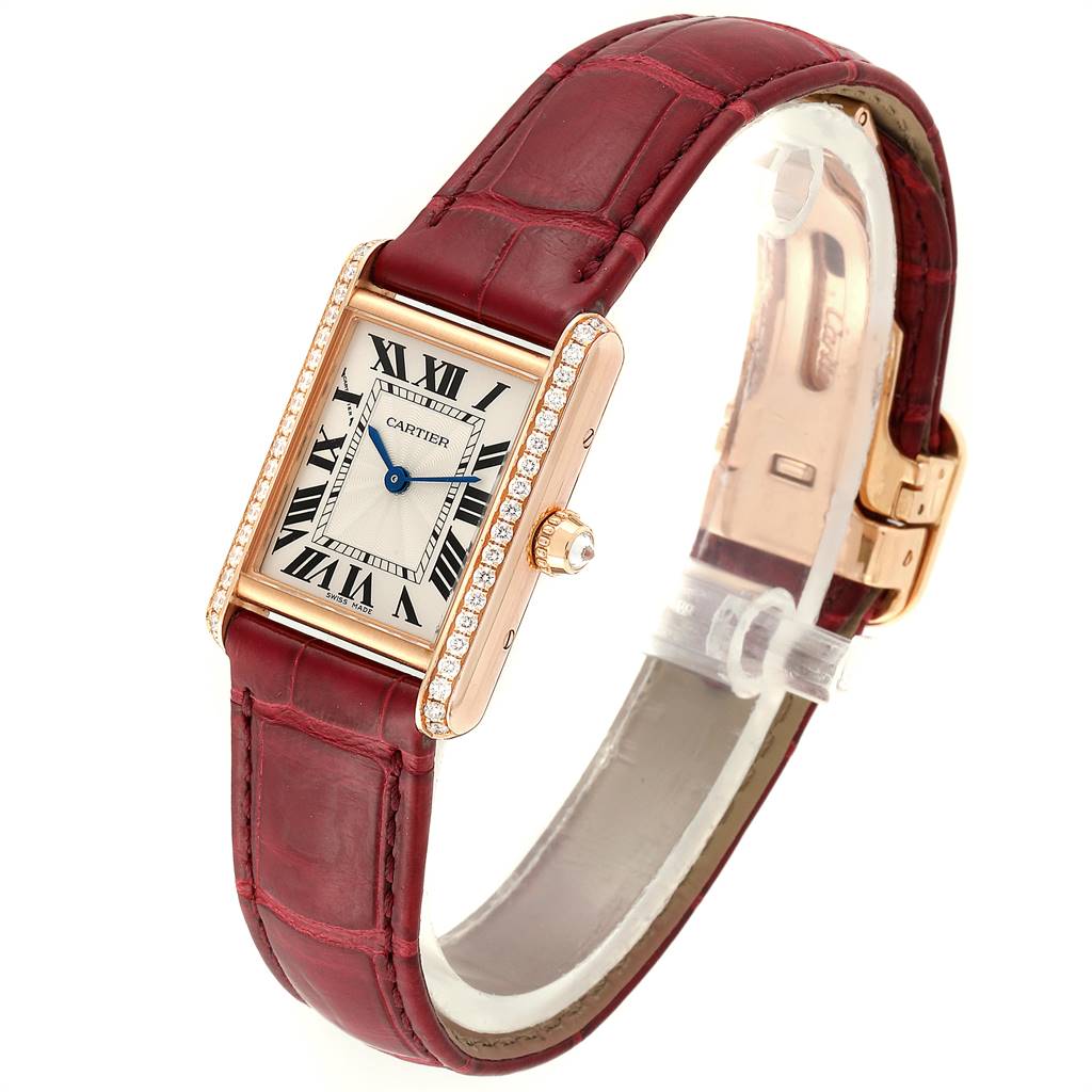 The image shows a Cartier Tank Louis WJTA0010 Women's Yellow Gold Silver Dial WJTA0010 Women's Yellow Gold Silver Dial watch from a three-quarter front angle, displaying the face, strap, and side details.