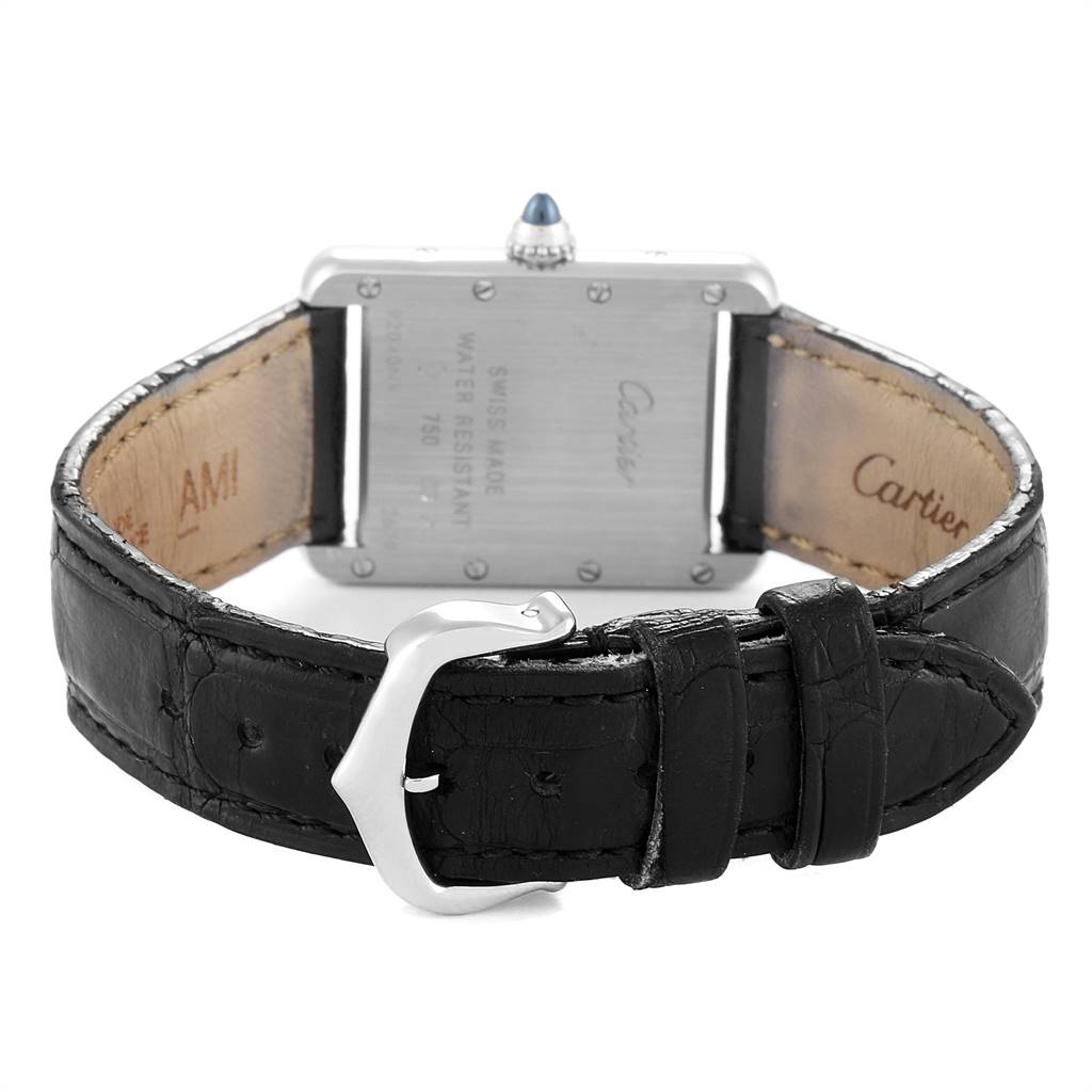 The image shows the back view of a Cartier Tank Louis W1541056 Women's White Gold Silver Dial W1541056 Women's White Gold Silver Dial watch, highlighting its leather strap and buckle.